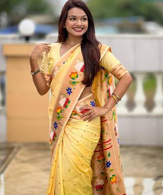 Cream elegant art silk woven saree with rich zari border 4