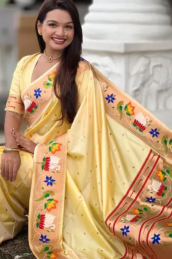 Cream elegant art silk woven saree with rich zari border