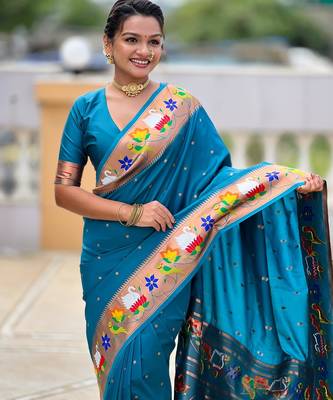 Turquoise elegant art silk woven saree with rich zari border 3
