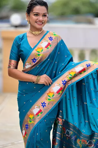 Turquoise elegant art silk woven saree with rich zari border