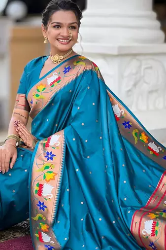 Turquoise elegant art silk woven saree with rich zari border
