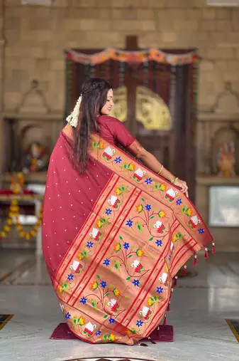 Maroon elegant art silk woven saree with rich zari border