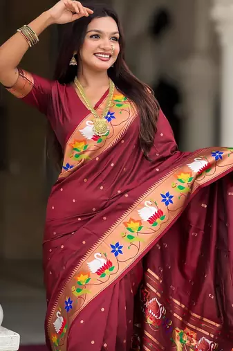 Maroon elegant art silk woven saree with rich zari border