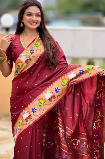 Maroon elegant art silk woven saree with rich zari border