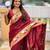 Maroon elegant art silk woven saree with rich zari border