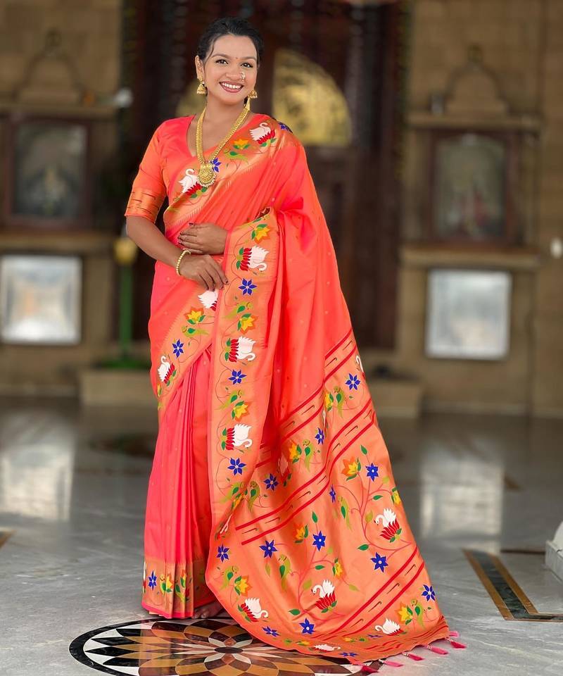 Orange elegant art silk woven saree with rich zari border