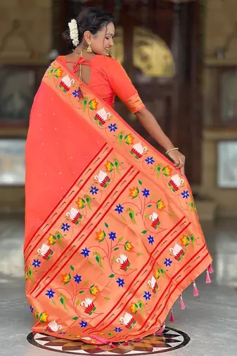 Orange elegant art silk woven saree with rich zari border
