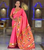 Peach elegant art silk woven saree with rich zari border