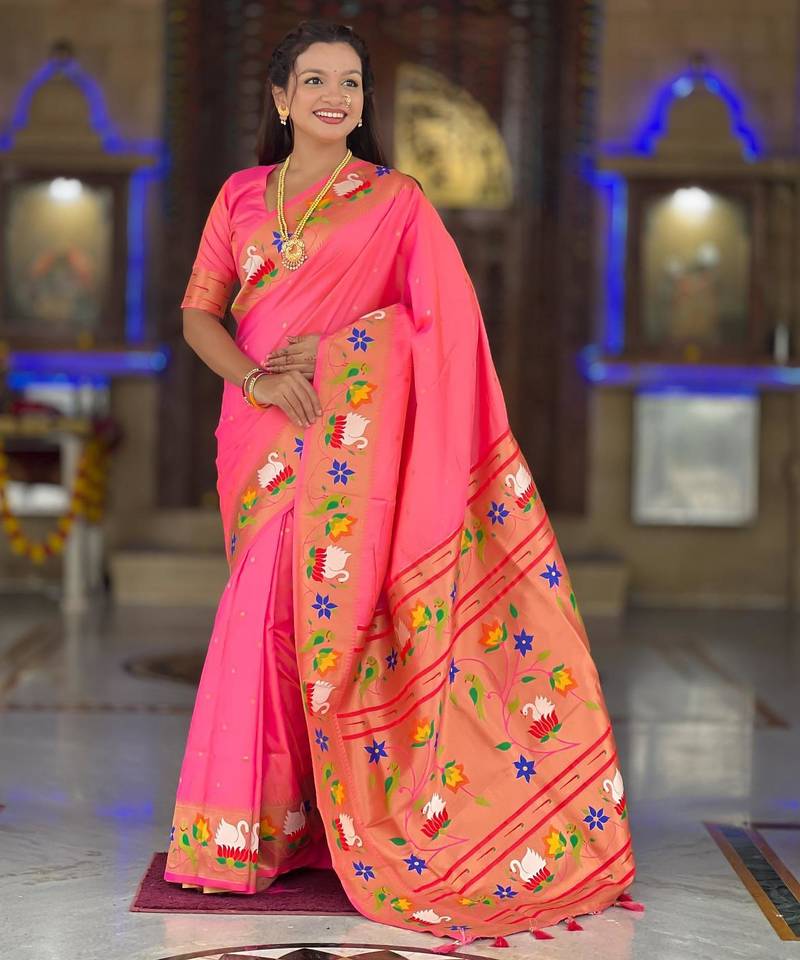 Peach elegant art silk woven saree with rich zari border