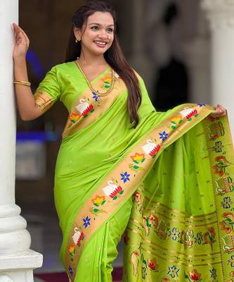 Green elegant art silk woven saree with rich zari border 3