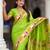 Green elegant art silk woven saree with rich zari border