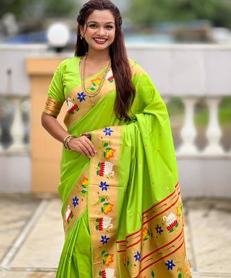 Green elegant art silk woven saree with rich zari border 4