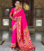 Pink elegant art silk woven saree with rich zari border