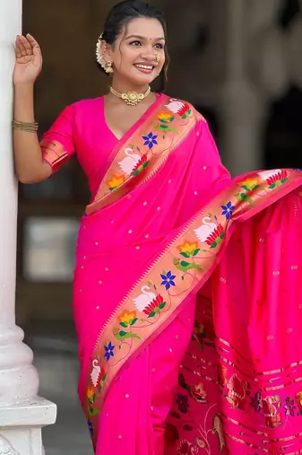 Pink elegant art silk woven saree with rich zari border