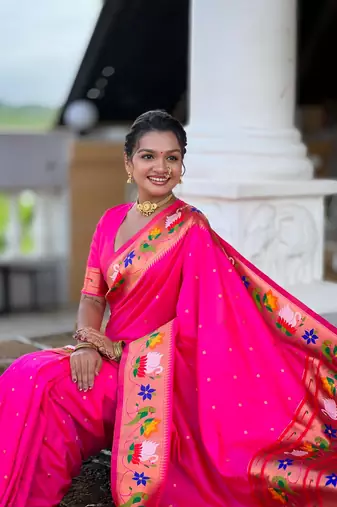 Pink elegant art silk woven saree with rich zari border