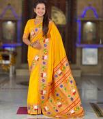 Yellow elegant art silk woven saree with rich zari border