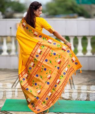 Yellow elegant art silk woven saree with rich zari border 2