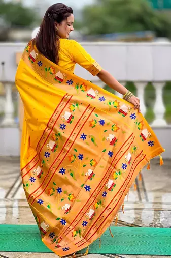 Yellow elegant art silk woven saree with rich zari border