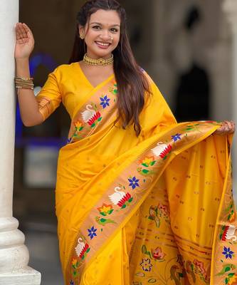 Yellow elegant art silk woven saree with rich zari border 3