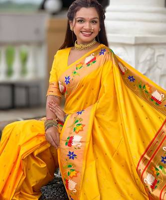 Yellow elegant art silk woven saree with rich zari border 5