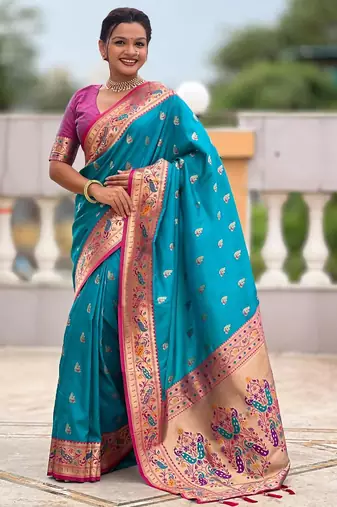Turquoise elegant art silk woven saree with rich zari border