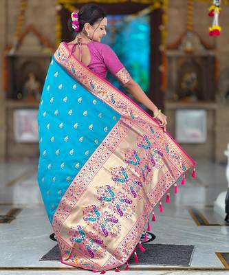 Turquoise elegant art silk woven saree with rich zari border 2