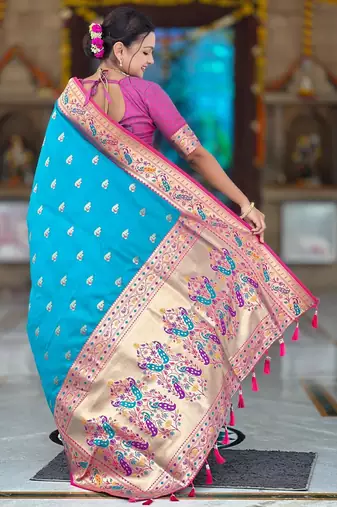 Turquoise elegant art silk woven saree with rich zari border