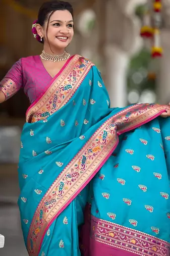 Turquoise elegant art silk woven saree with rich zari border