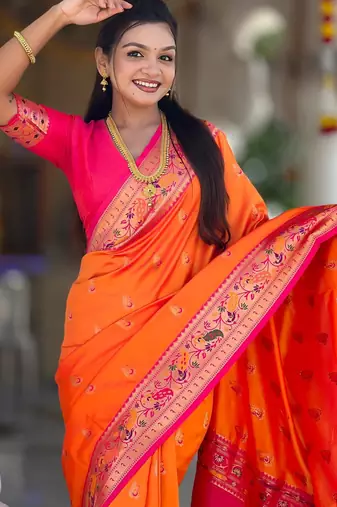 Orange elegant art silk woven saree with rich zari border