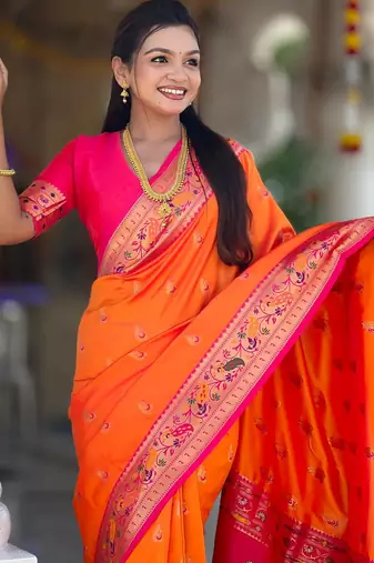 Orange elegant art silk woven saree with rich zari border