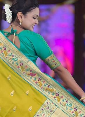 Green elegant art silk woven saree with rich zari border 2