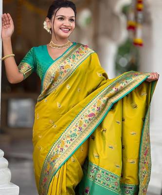 Green elegant art silk woven saree with rich zari border 3