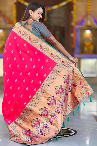 Pink elegant art silk woven saree with rich zari border