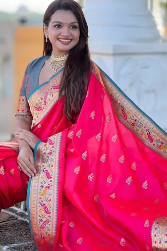 Pink elegant art silk woven saree with rich zari border