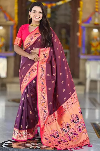 Wine elegant art silk woven saree with rich zari border