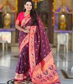 Wine elegant art silk woven saree with rich zari border