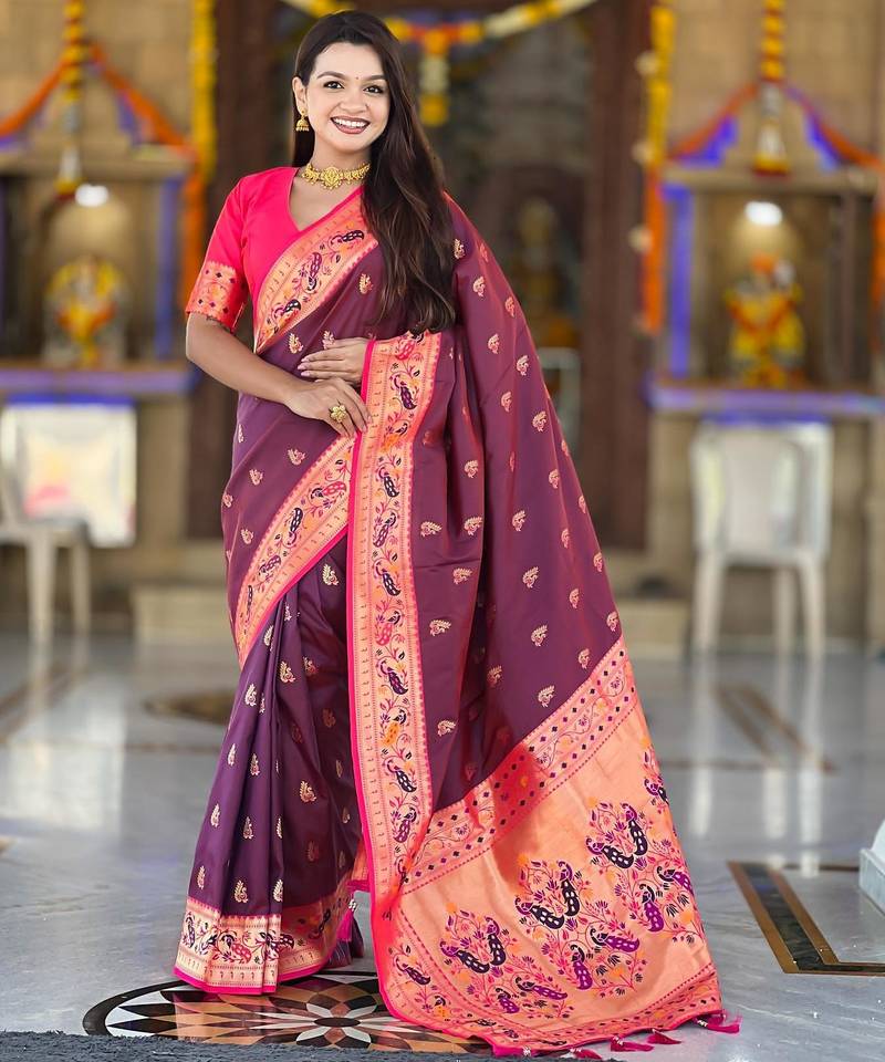 Wine elegant art silk woven saree with rich zari border