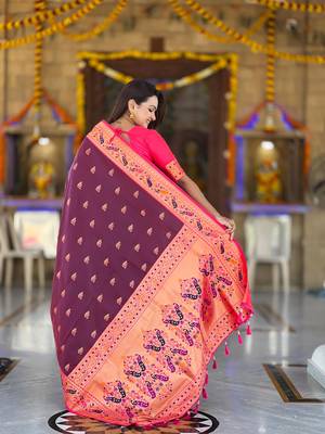 Wine elegant art silk woven saree with rich zari border 2