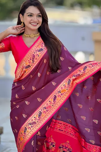 Wine elegant art silk woven saree with rich zari border