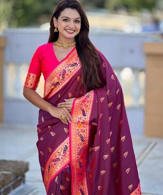 Wine elegant art silk woven saree with rich zari border 4