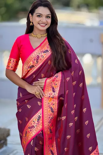 Wine elegant art silk woven saree with rich zari border