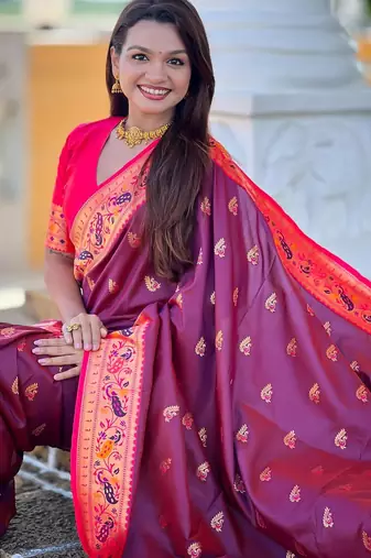 Wine elegant art silk woven saree with rich zari border