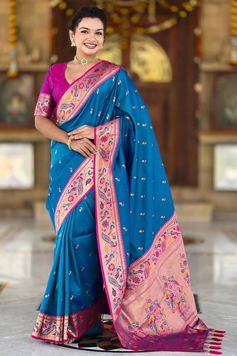 Turquoise elegant art silk woven saree with rich zari border