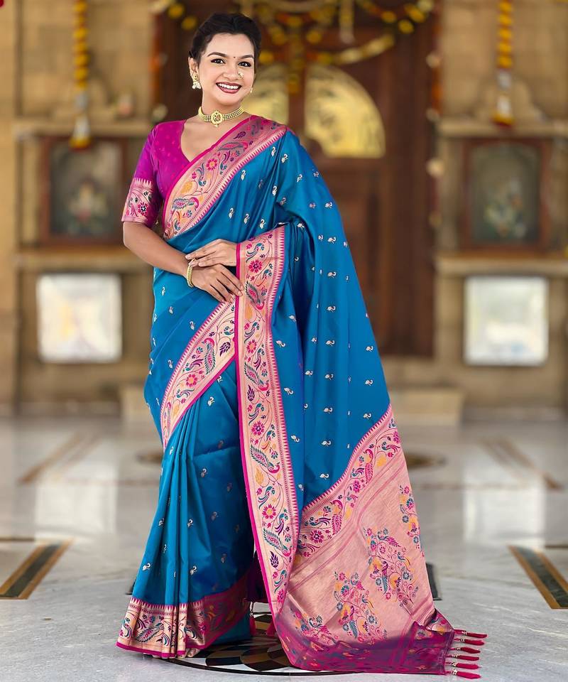 Turquoise elegant art silk woven saree with rich zari border