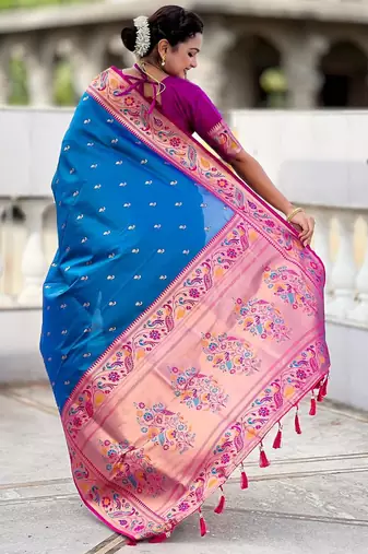 Turquoise elegant art silk woven saree with rich zari border