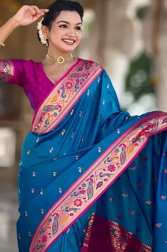 Turquoise elegant art silk woven saree with rich zari border