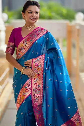 Turquoise elegant art silk woven saree with rich zari border