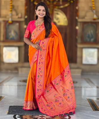 Orange elegant art silk woven saree with rich zari border 1