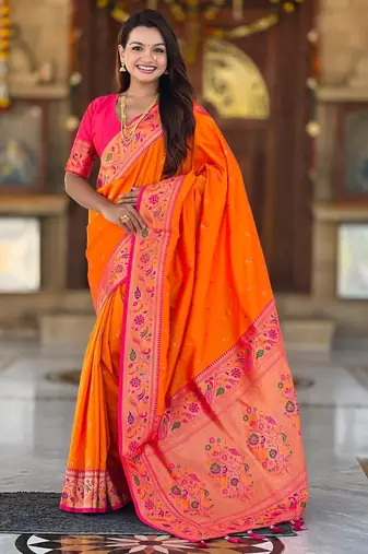 Orange elegant art silk woven saree with rich zari border