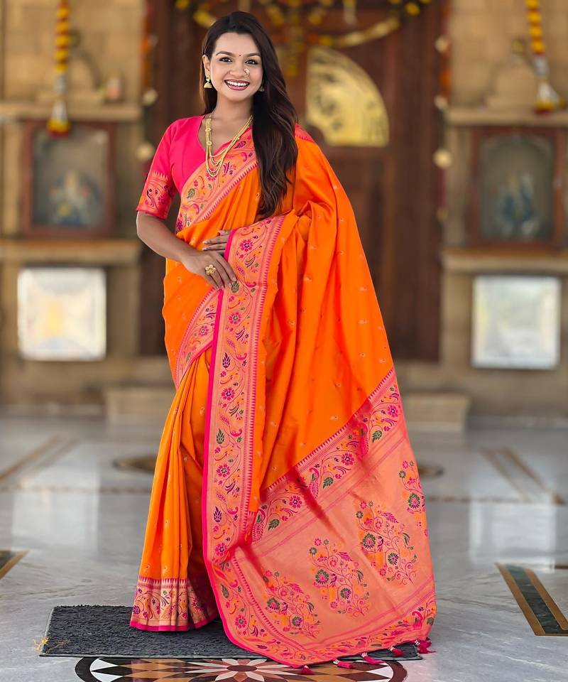 Orange elegant art silk woven saree with rich zari border